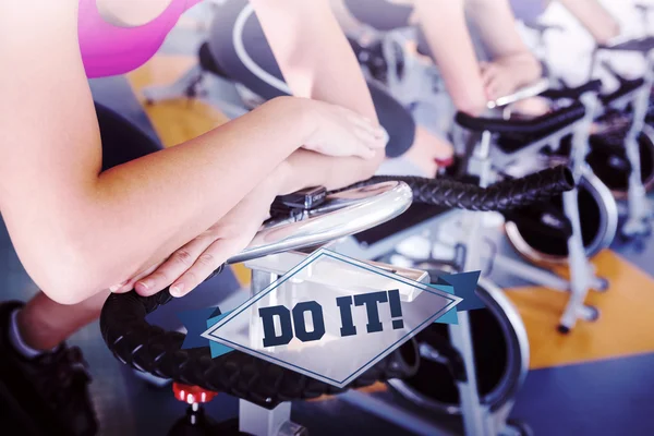 The word do it! and spin class working out in a row