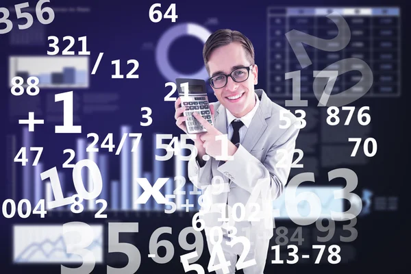 Geeky smiling businessman showing calculator