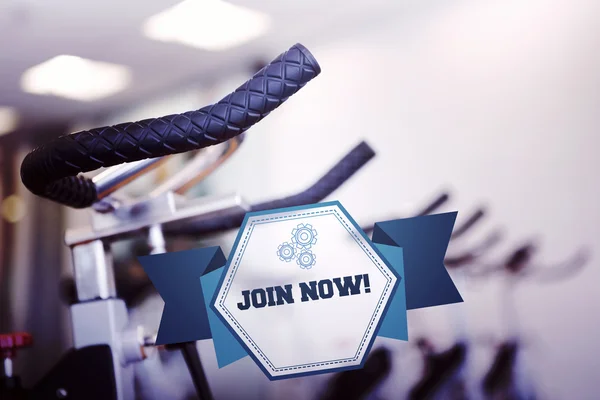 Join now against row of exercise bikes