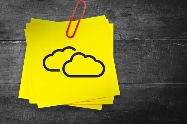Clouds graphic against sticky note