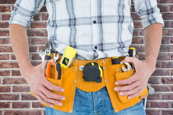 Technician with tool belt