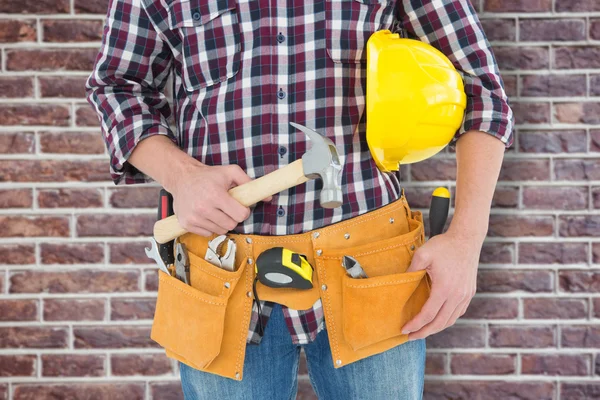 Repairman with hard hat and hammer