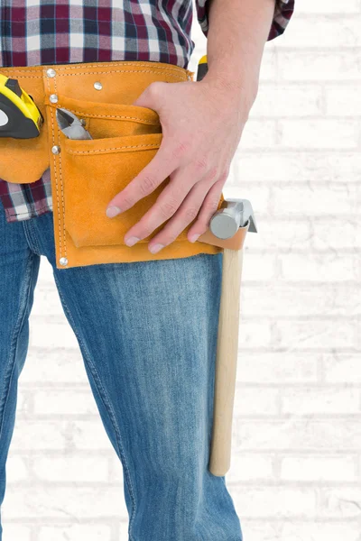 Handyman wearing tool belt