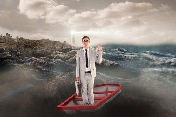Businessman waving in boat against stormy sea