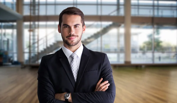 Businessman posing with arms crossed