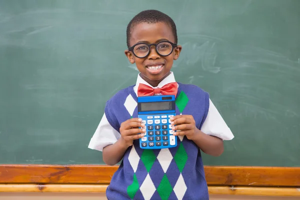 Happy pupil showing calculator