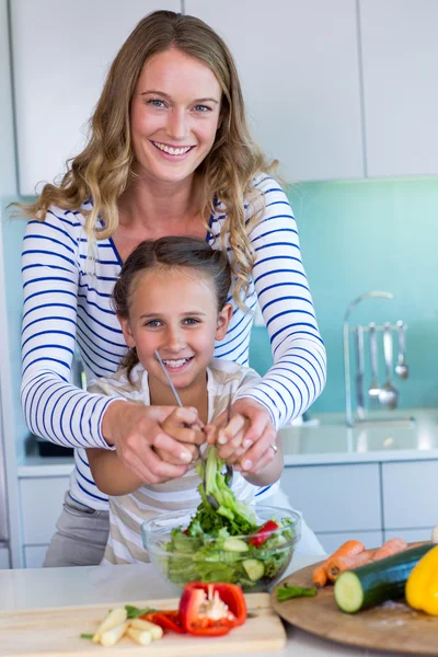 Happy family preparing lunch together