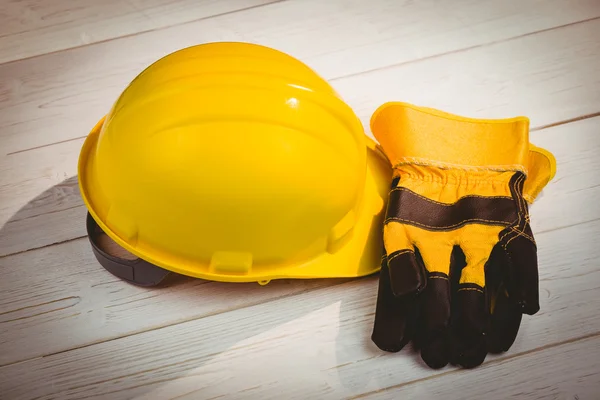 Hard hat and protective gloves