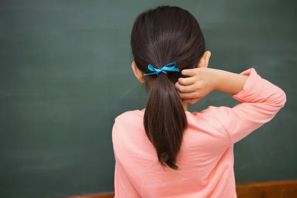 Pupil looking at board