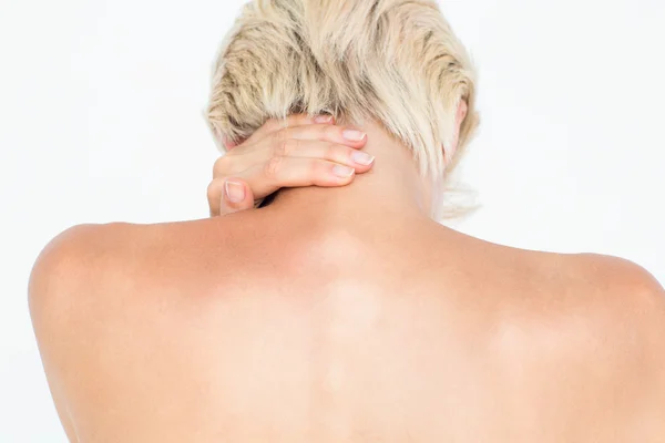 Attractive woman suffering from neck pain