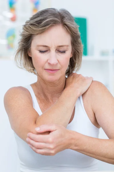 Woman having elbow pain