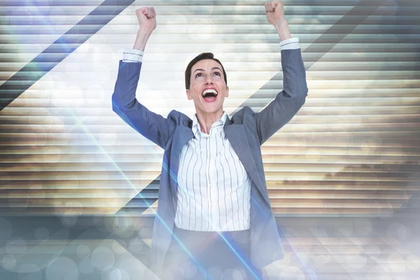 Composite image of cheering businesswoman