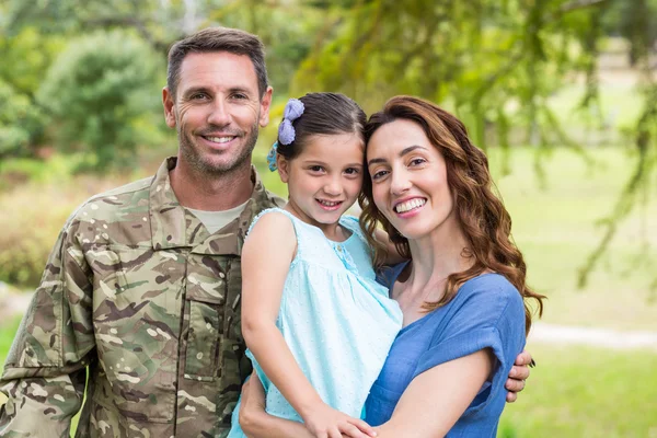 Handsome soldier reunited with family