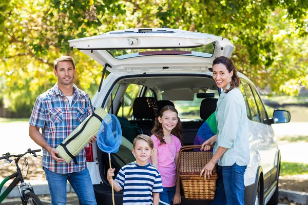 Family getting ready for road trip