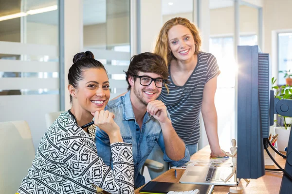 Professional designers working on computer