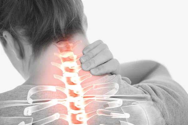 Highlighted spine of woman with neck pain