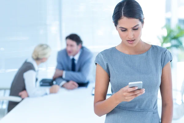 Businesswoman receiving bad news on phone