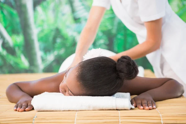 Woman enjoying back massage