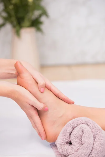 Woman receiving foot massage