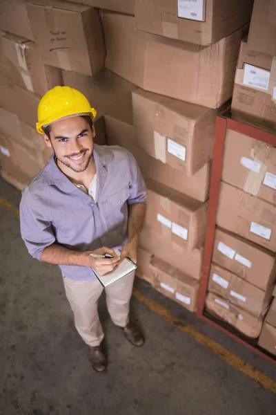 Worker clipboard in warehouse