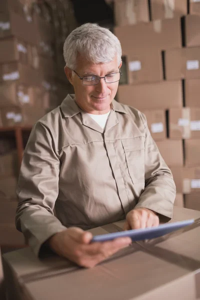 Worker using digital tablet