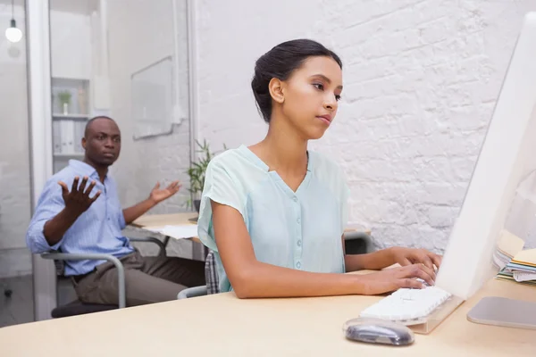 Businessman annoyed with colleague