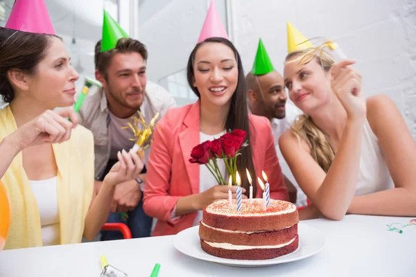 Business team celebrating birthday