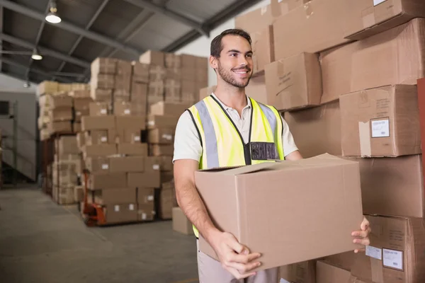 Worker carrying box