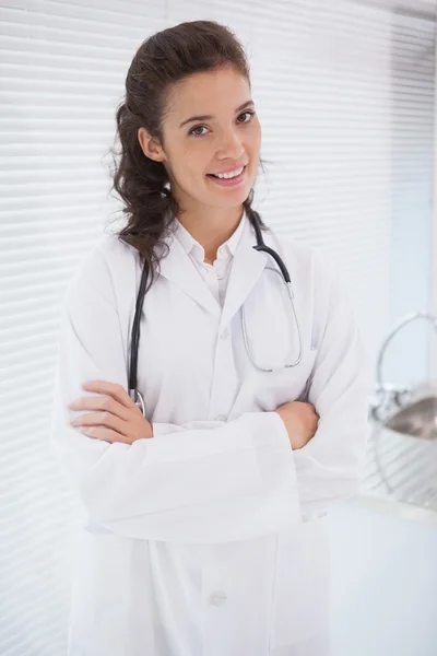 Doctor with stethoscope arms folded