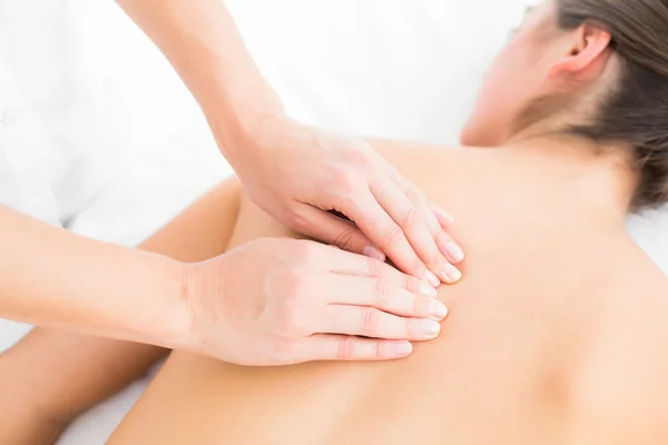 Woman enjoying a back massage