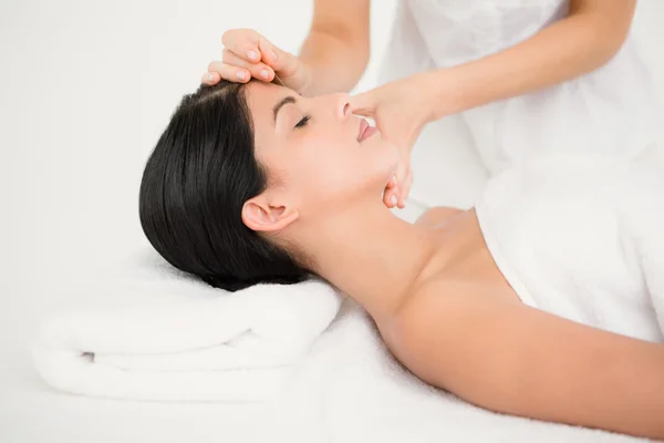 Woman in an acupuncture therapy at spa