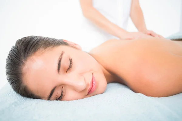 Brunette enjoying a massage