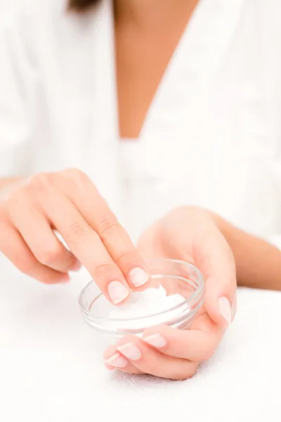 Woman applying cream