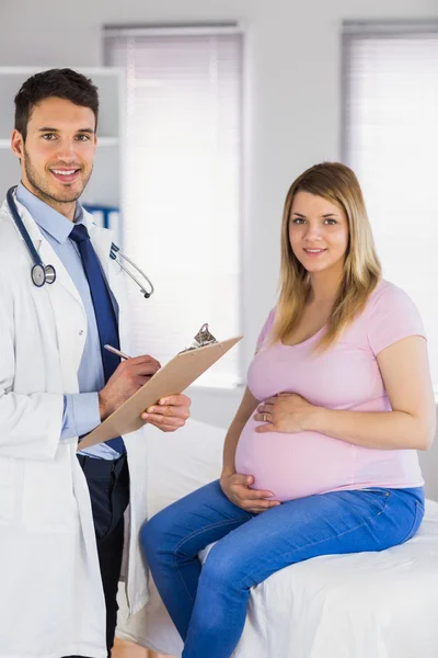 Doctor and his pregnant patient