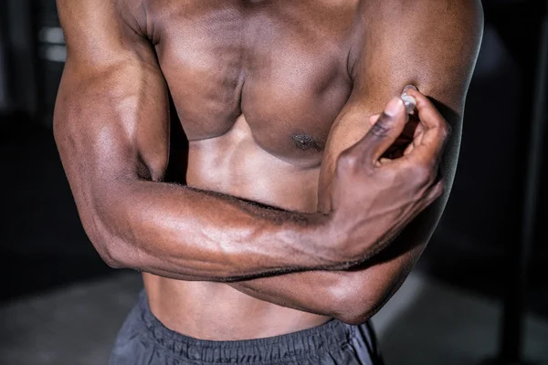 Young Bodybuilder showing his muscles