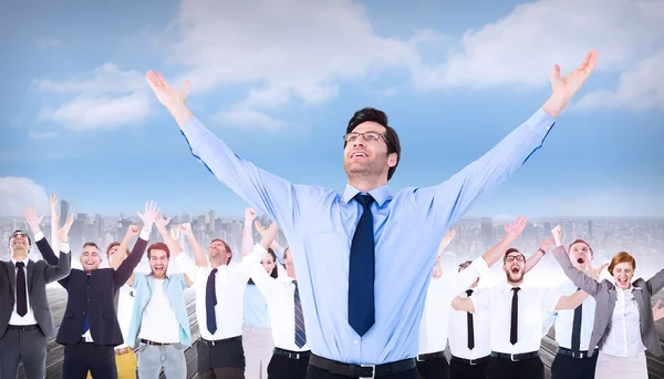 Businessman with arms raised up