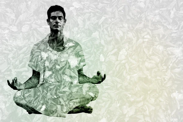 Man meditating in lotus pose