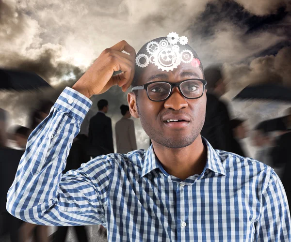 Businessman thinking scratching head