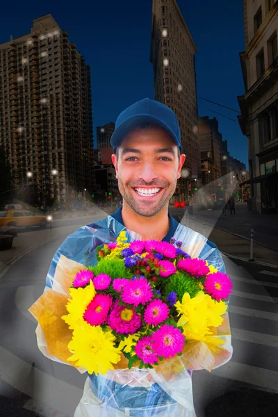 Delivery man holding bouquet