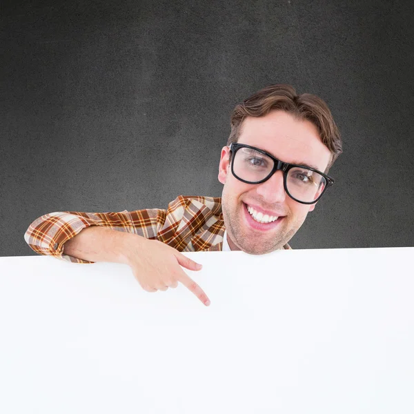 Nerdy businessman pointing to poster