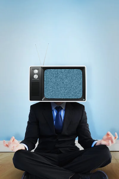 Businessman with tv instead head