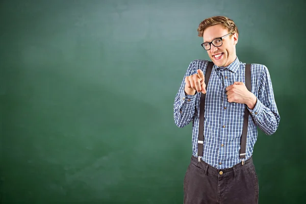 Geeky hipster pointing at camera