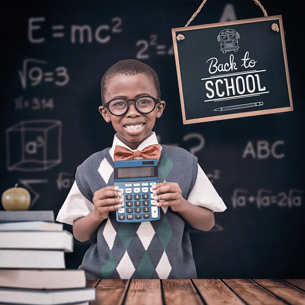 Happy pupil with calculator