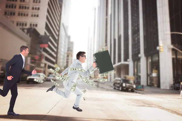 Composite image of running businessman