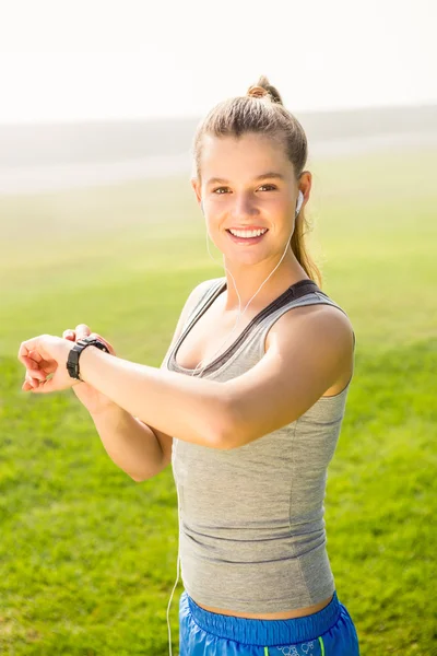 Blonde using smart watch