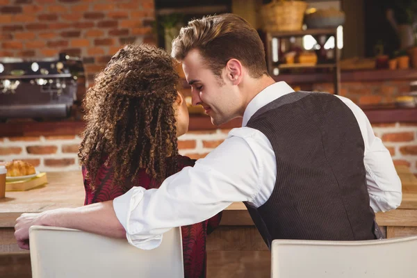 Happy couple about to kiss