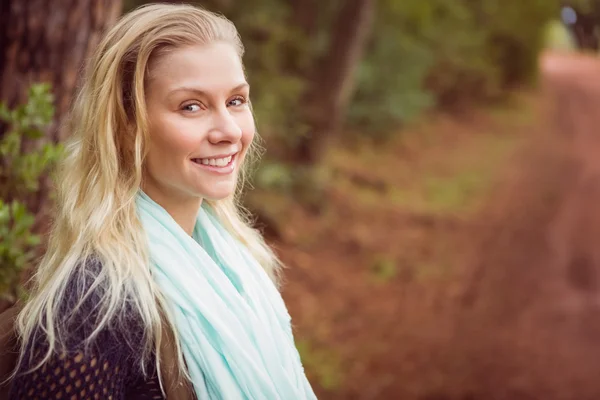 Smiling female hiker waiting