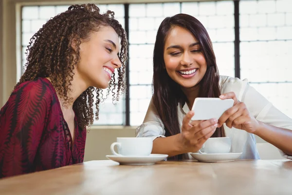 Female friends having coffee