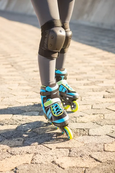 Woman wearing inline skates