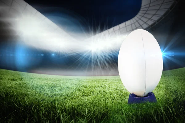 Rugby ball against rugby stadium